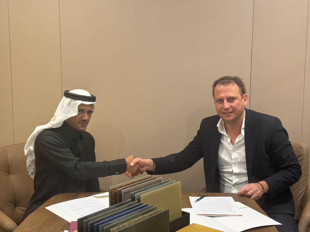 AJYAL and Solarix partnership signing with solar facade samples